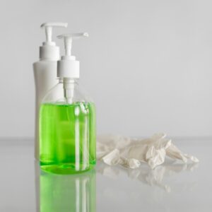 white and green pump bottle