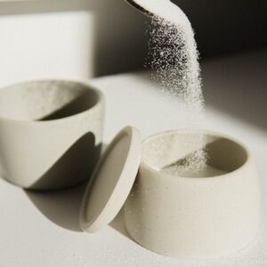 white ceramic bowl on white table